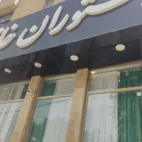 پیک موتوری و صندوق دار خانم