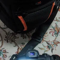 دوربین کنون R 100