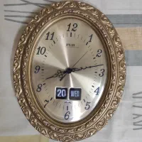 ساعت دیواری تقویم‌دار