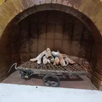 شومینه گازی همراه هیزم تزئینی