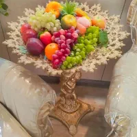 جا میوه به همراه انواع میوه های متنوع ( مصنوعی)