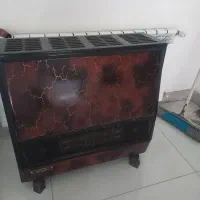 میز کار و میز کامپیوتر و دو عدد بخاری