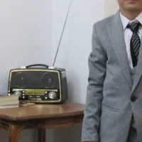 یک دست کت شلوار و کفش بچگانه در حد نو