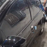 شیشه دودی آنتیuv شیشه جلو فتوکرومیک سه سال گارانتی