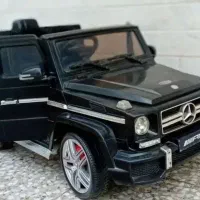 ماشین شارژی مشکی و موتور دو موتوره