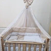 تخت خواب کنارمادری