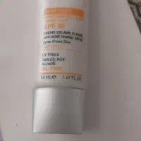 کرم ضد افتاب ضد جوش تینت دار SPF50 برند Erikeh