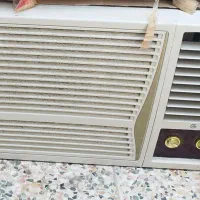 یک عدد کولر و یک عدد ماشین لباسشویی