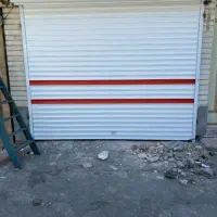 نصب وتعمیر درکرکره برقی جک پارکینگ شیشه سکوریت