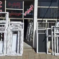 تولیددرب و پنجره دوجداره توری کشویی شیشه بالکنی