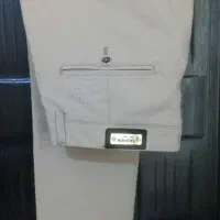 تعدادی شلوار و پیراهن مردانه