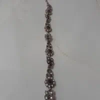 ساعت طلایی زنانه و دستبند نگین دار