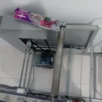 دستگاه رول کن