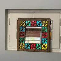 آینه و ساعت چوبی