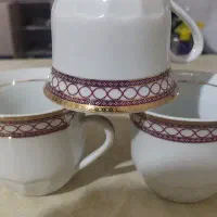 دودست فنجان نلبکی ویک عدد قوری بلند ویک شکر پاچ