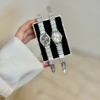 ساعت مجلسی طلایی و نقره‌ای