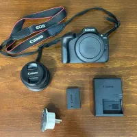 دوربین R100 canon + کیت لنز 18-45 / کم کارکرد