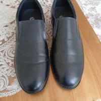 کفش مصوب چرم و لباس حراست مشکی