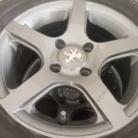 رینگ و لاستیک پنج پر دودی
