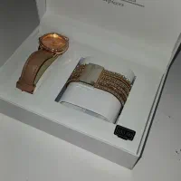 ساعت مچی و دستبند  L& CO