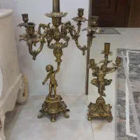 خریدار  آینه وشعمدان و لوستر و ظروف مسی و روحی