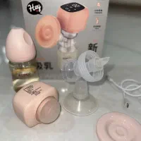 شیردوش برقی و شیشه شیر براوون