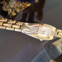 ساعت Guess زنانه طلایی نگین‌دار