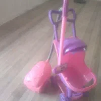 کالسکه و جاروبرقی کودک
