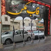 آیینه دفرمه چراغ دار و قاب دار