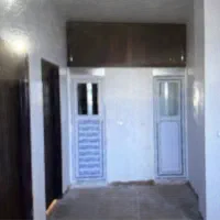 زمین و خانه شیشه گر