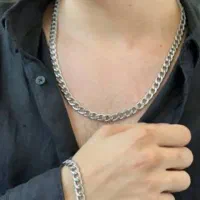 ست گردنبند و دستبند کارتیر مردانه معاوضه با کبوتر