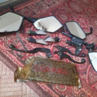 آینه موتورسیکلت NS و زنجیر  NS چراغ راهنما