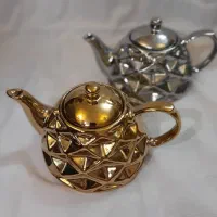 قوری طلایی مشبک سه روز 195