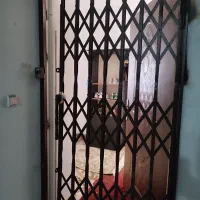 درب آکاردیونی محافظ ساختمان