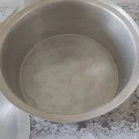 قابلمه رویی سایز50 با ملاقه چوبی بلند