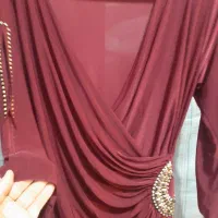یک عدد لباس مجلس زنانه ویک لباس مردانه ته