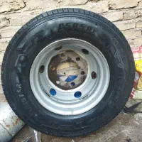 لاستیک و رینگ ایسوزو و یک دستگاه دوچرخه المپیا ۲۶