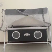 گهواره کنار مادر و روروعک