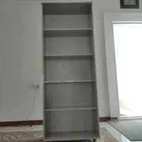 قفسه کتاب و وسیله