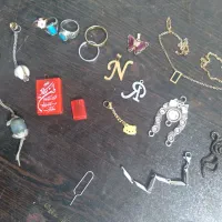 ضایعات نقره گردنبند.پلاک.زنگوله .رکاب نقره .وعیره