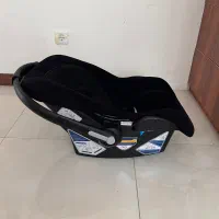 کریر پلیکان و تخت گهواره ای کنار مادر