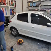 شیشه دودی خودرو تضمینی نصب تخصصی