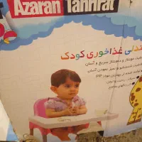 صندلی غذا خوری  تاپ کودک  کلی اسباب بازی چهار چرخه