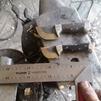 چاقوهای کرگدن،استادمسعود.دسته شاخ مشکی وچوب گردو.