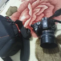 دوربین نیکون 5200 به همراه لنز 50 فیکس
