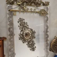 فروش آینه کنسول و ساعت و آویز لباس برنجی