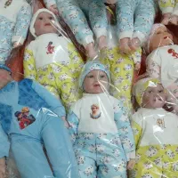 عروسک بدن پنبه‌ای نوزاد خواب و بیدار خندان