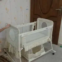 گهواره و صندلی غذا کودک