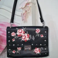 کیف چرم گلدوزی شده