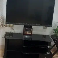 میزتلویزیون شیشه‌ای